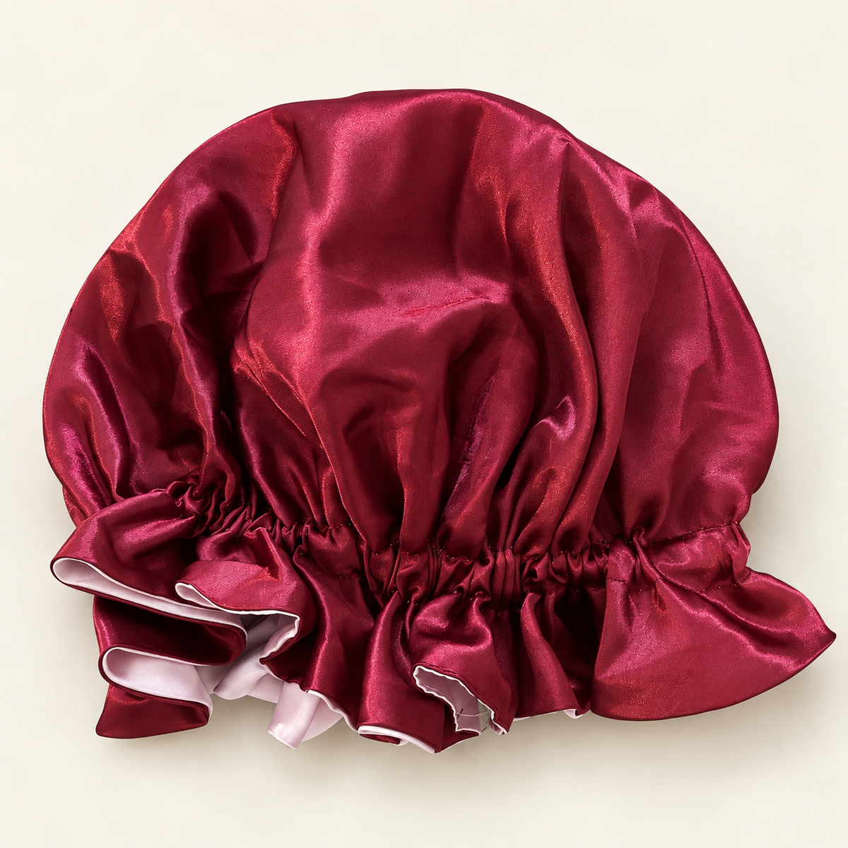 Bonnet en satin réversible rose et bordeaux Curlizea – côté bordeaux